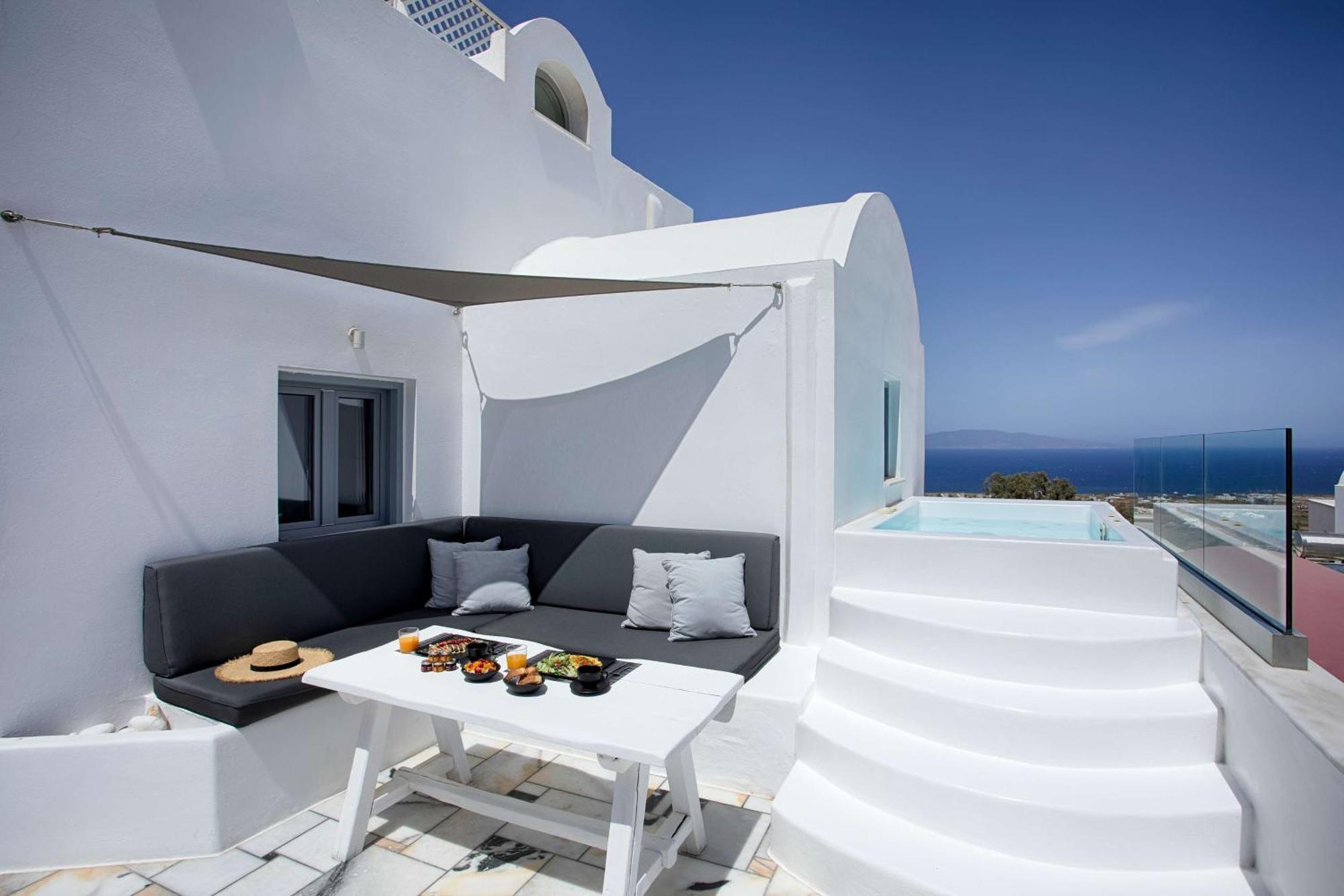 The ArmonOia Cycladic Villa Outdoor Hot Tub Caldera View