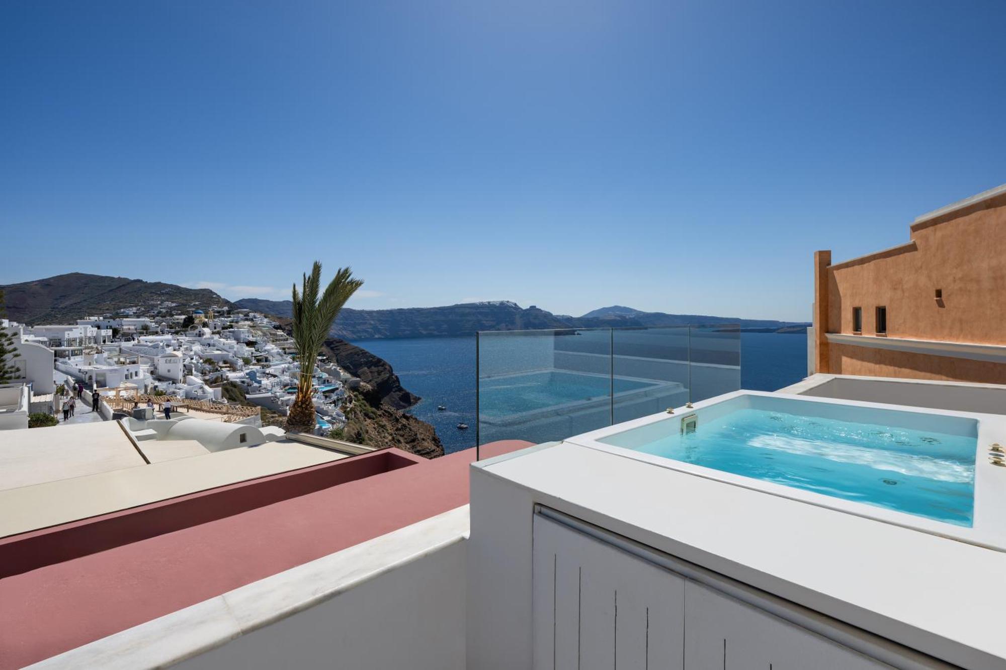 The ArmonOia Cycladic Villa Outdoor Hot Tub Caldera View