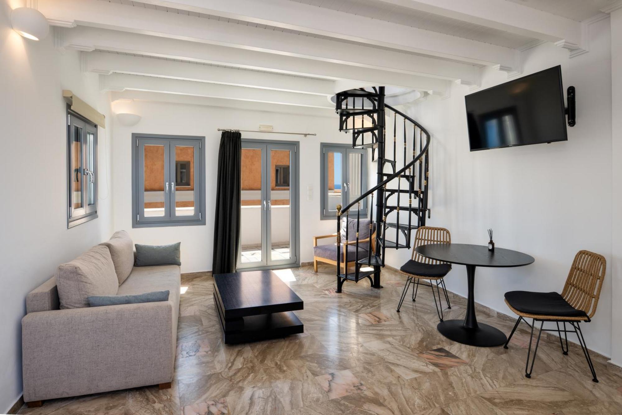 The ArmonOia Cycladic Villa Outdoor Hot Tub Caldera View